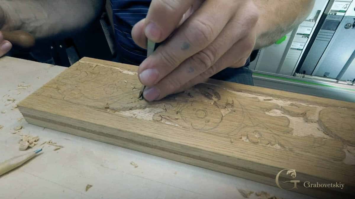 Small chisel through oak, the pencil pattern still readable, bench covered in shavings