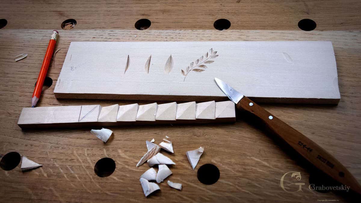 Basswood practice board covered in rows of beginner cuts