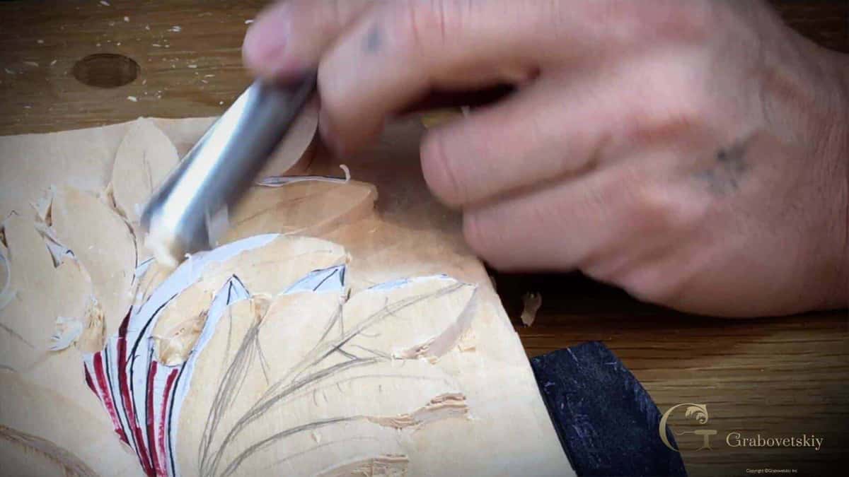 Gouge entering the leaf exactly where the red centre line marks the change of direction