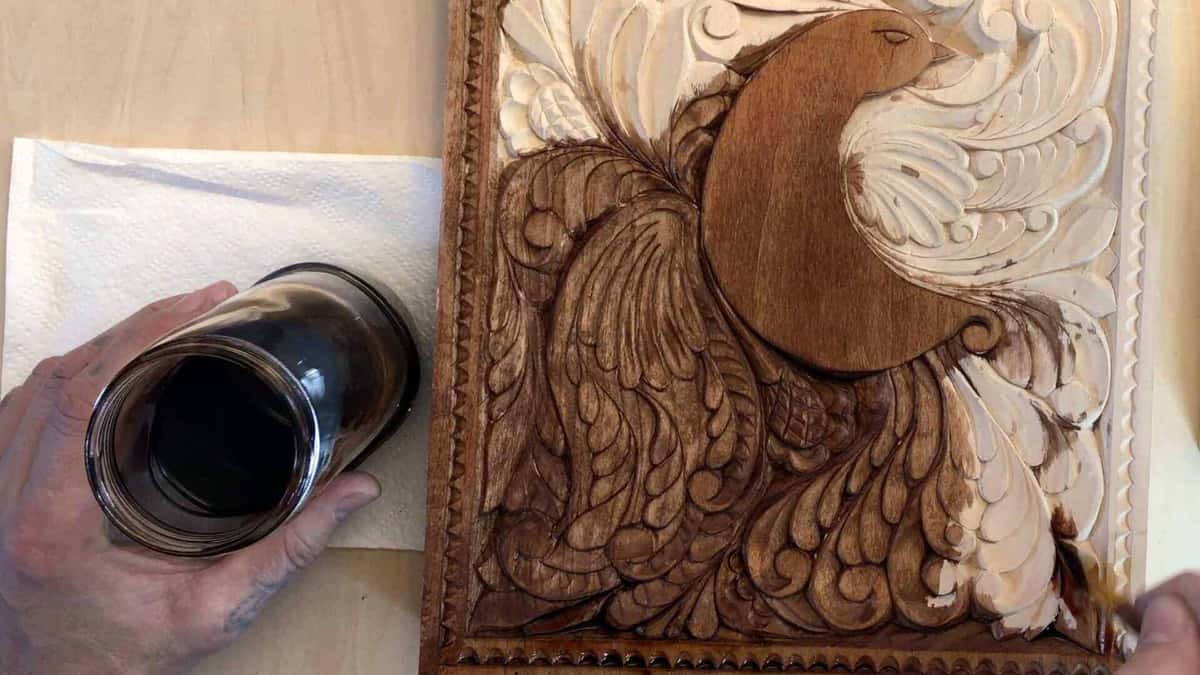 Carved panel half sealed, half bare