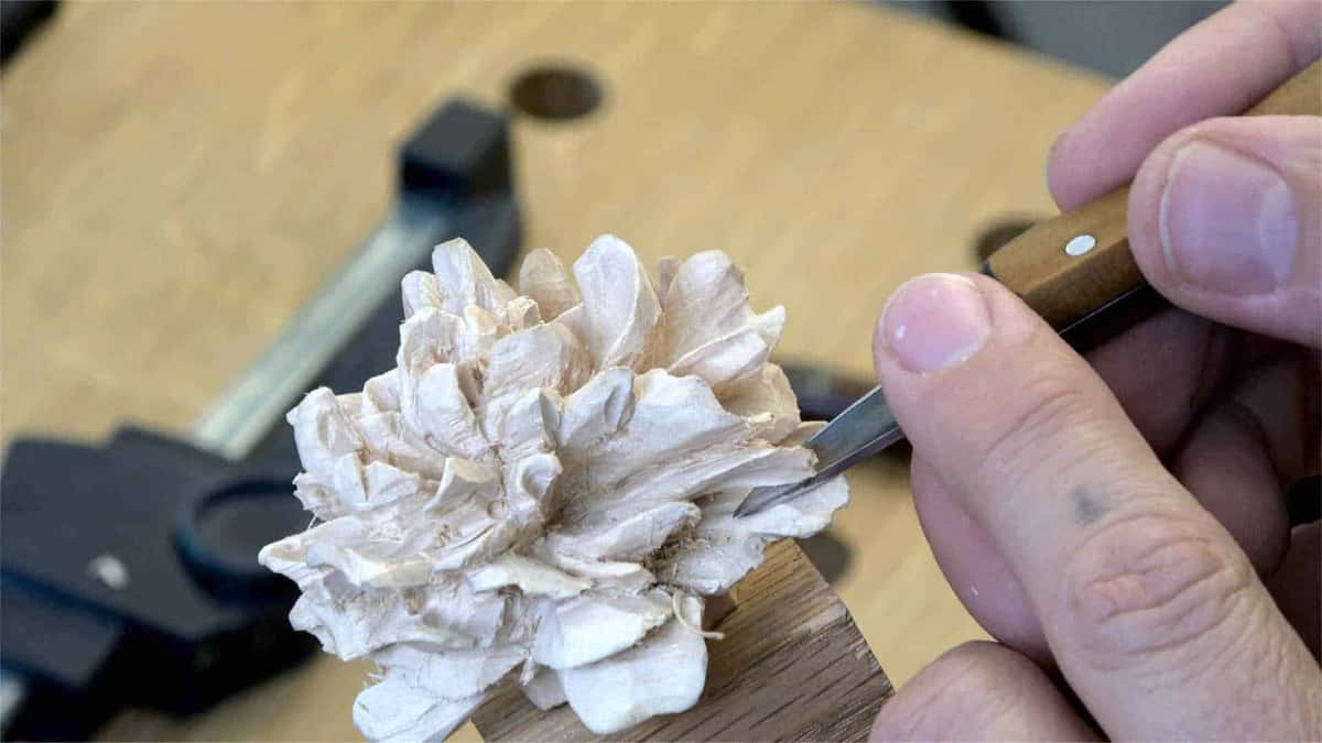 Thin petals get shaped with a skew knife.