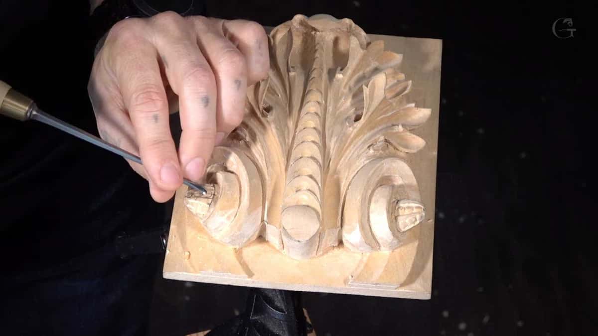 A fine V tool marking veins into a volute.