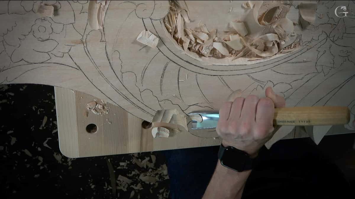 Pale panel covered in pencil, one shaving lifting