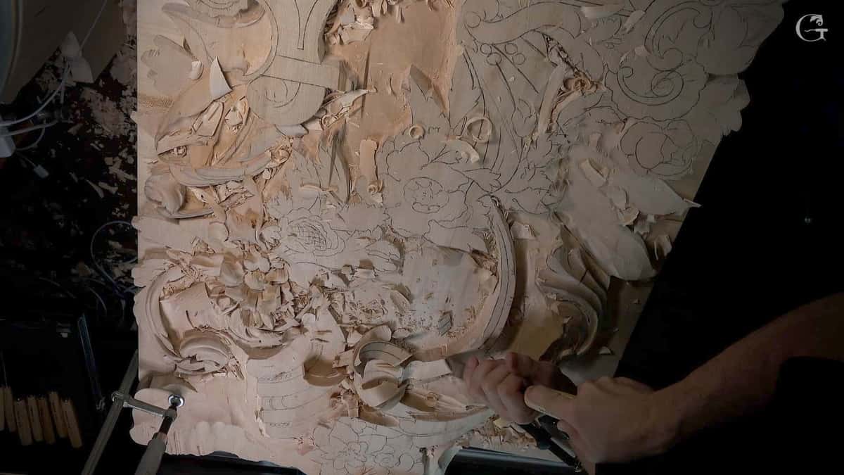 Large panel half roughed out under scattered chips.