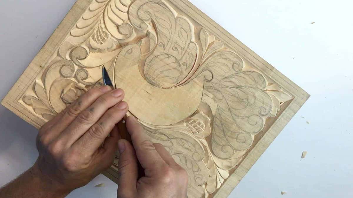 Pencil lines surviving on the raised center of a carved panel
