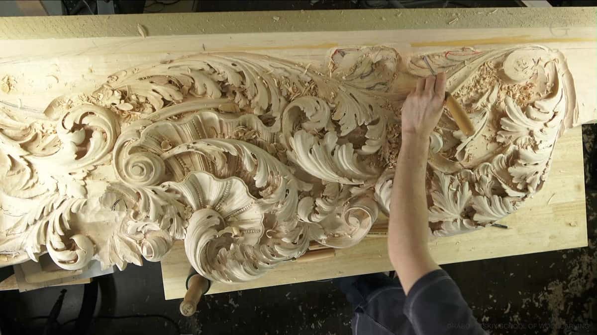 Long limewood frieze carved in deep relief