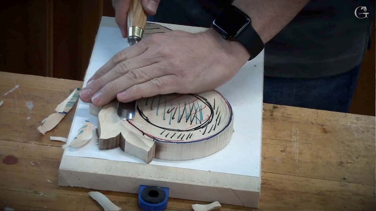 Byzantine acanthus roughed out in limewood with red layout lines