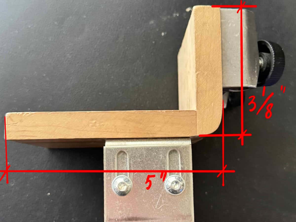 Shop made L bracket with its dimensions drawn on