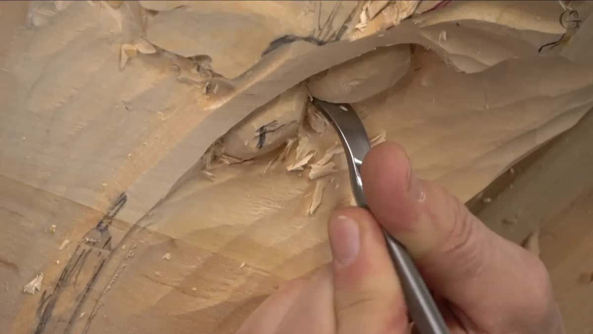 Bent shank tool curling in beside a lump lettered in pencil