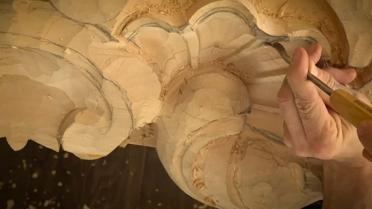 Grip right at the ferrule, pale handle behind