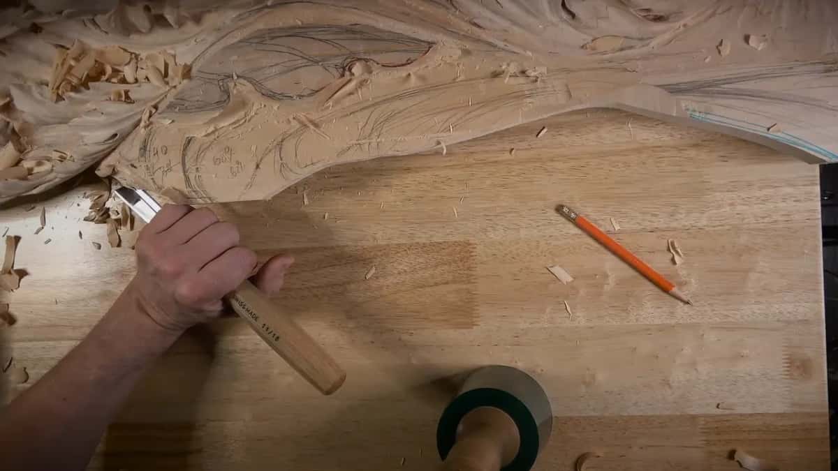 Gouge angled into a fresh outline