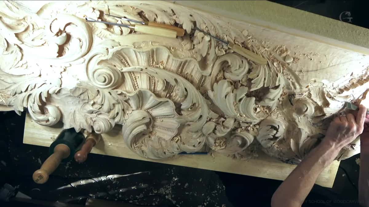 Arm stretched to the far end of the panel.