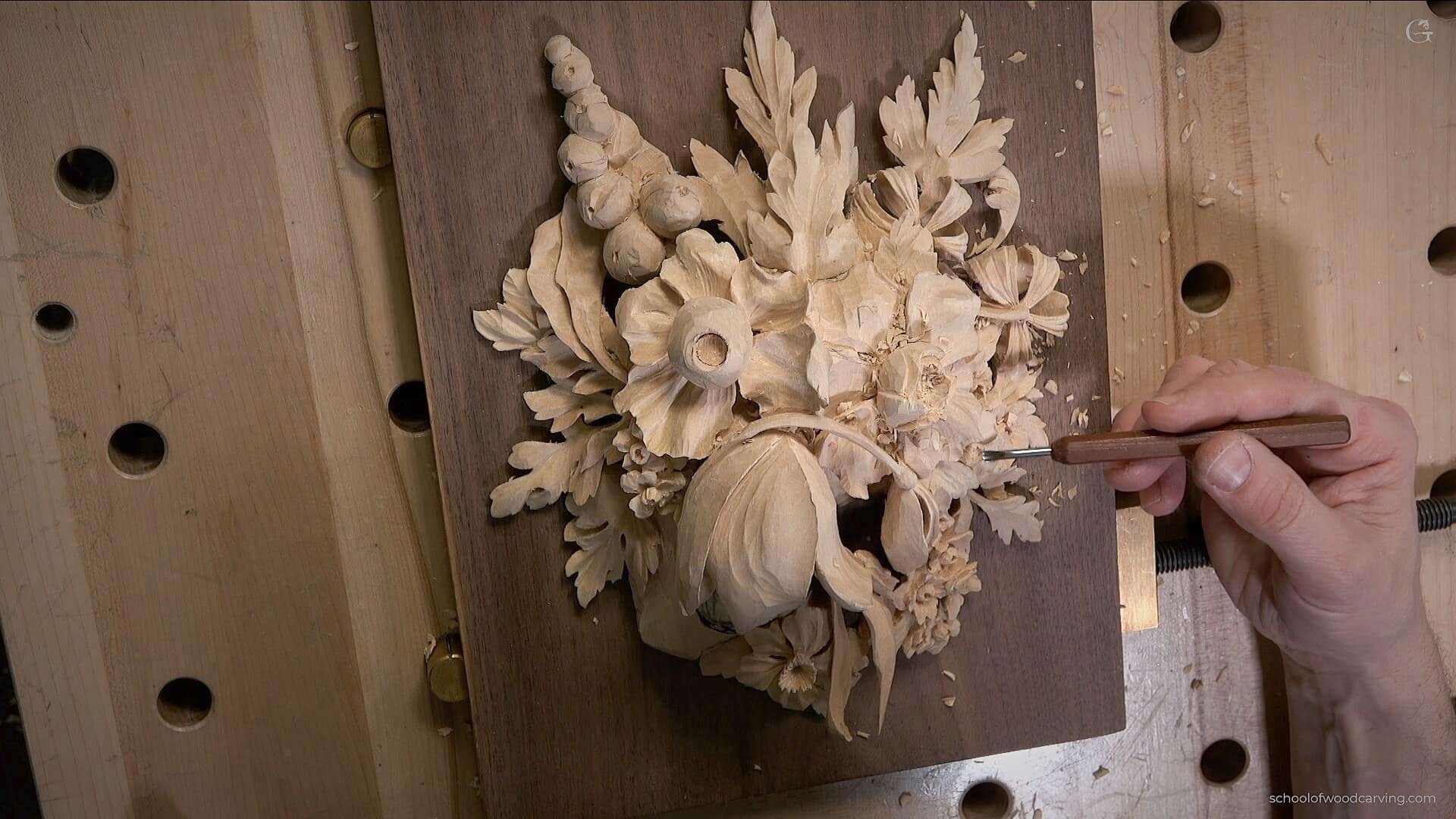 What is the first step in wood carving?