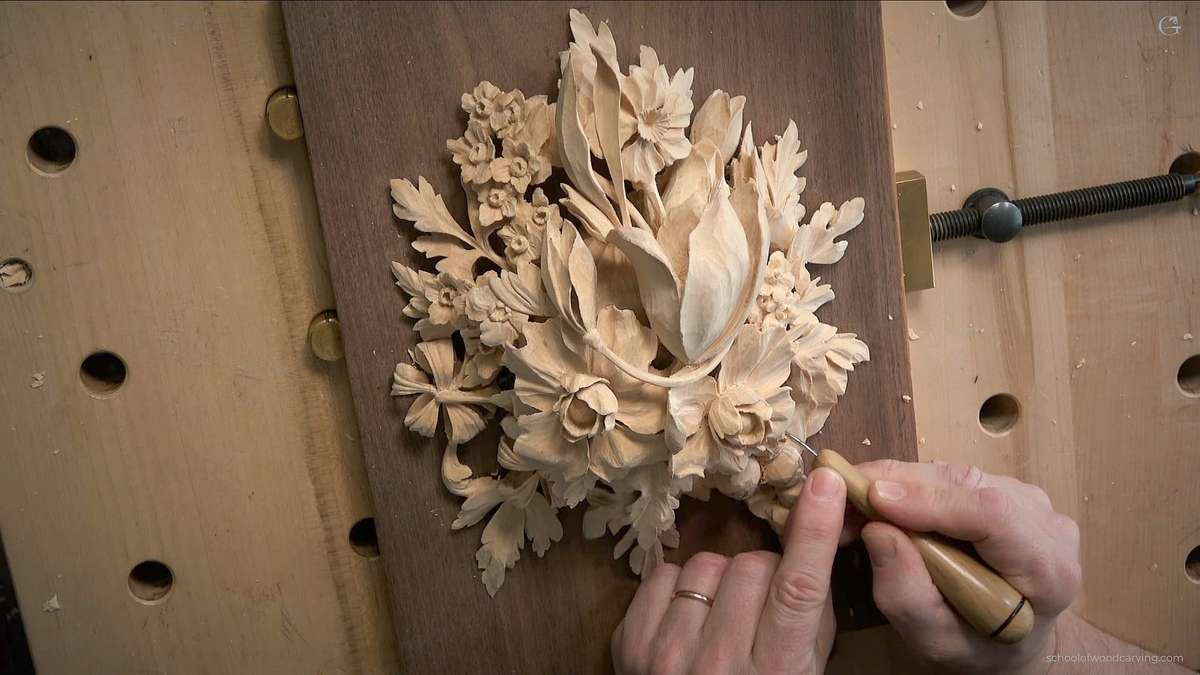 Alexander Grabovetskiy Teaches how to Carve Wood. Unleash your creativity and hone your woodcarving skills with Alexander Grabovetskiy's in-person Maine Woodcarving class. His expertise in the intricate and delicate Grinling Gibbons-style will help you create stunning wood carvings that are truly unique. German: Alexander Grabovetskiy lehrt Holzschnitzerei. Entfesseln Sie Ihre Kreativität und verfeinern Sie Ihre Holzschnitzfähigkeiten mit Alexanders In-Person Maine Woodcarving-Kurs. Seine Expertise im filigranen und delikaten Grinling Gibbons-Stil hilft Ihnen, atemberaubende Holzschnitzereien zu schaffen, die wirklich einzigartig sind. Russian: Александр Грабовецкий учит резьбу по дереву. Разблокируйте свою креативность и оттачивайте свои навыки резьбы по дереву с Александром Грабовецким на личном уроке по резьбе по дереву в штате Мэн. Его опыт в тонком и изысканном стиле Гринлинга Гиббонса поможет вам создавать потрясающие резные изделия из дерева, которые действительно уникальны. Spanish: Alexander Grabovetskiy enseña a tallar madera. Desata tu creatividad y perfecciona tus habilidades de tallado en madera con el curso en persona de Alexander Grabovetskiy en Maine Woodcarving. Su experiencia en el intrincado y delicado estilo Grinling Gibbons te ayudará a crear impresionantes tallados en madera que son realmente únicos. Chinese: 亚历山大·格拉博韦茨基教你如何雕刻木材。通过亚历山大的现场缅因州木雕课程,释放你的创造力,磨练你的木雕技巧。他对于Grinling Gibbons风格的熟练掌握将帮助您创建独特而惊人的木雕作品。 Japanese: アレクサンダー・グラボヴェツキーによる木彫りのクラス。アレクサンダー・グラボヴェツキーの直接指導の下、クリエイティブな能力を解放し、ミーン州における木彫りクラスで木彫りの技術を磨き上げましょう。グリンリング・ギボンスのスタイルの緻密で繊細な技術に精通している彼の知識を生かして、本当にユニークな見事な木彫作品を作成できます。