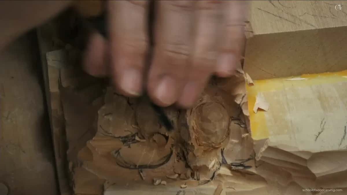 Marking five main motions around the husk, the same count used when carving an acanthus leaf