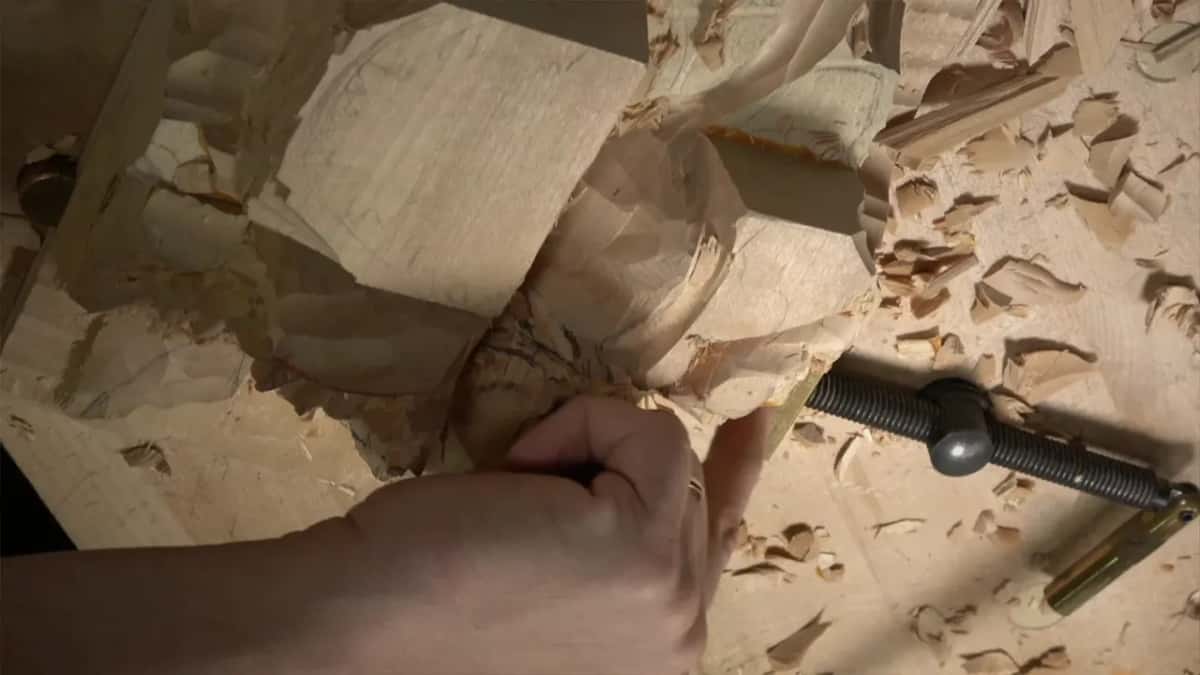 Shaping the husk into an even barrel and setting the triangle where two hazelnut husks meet