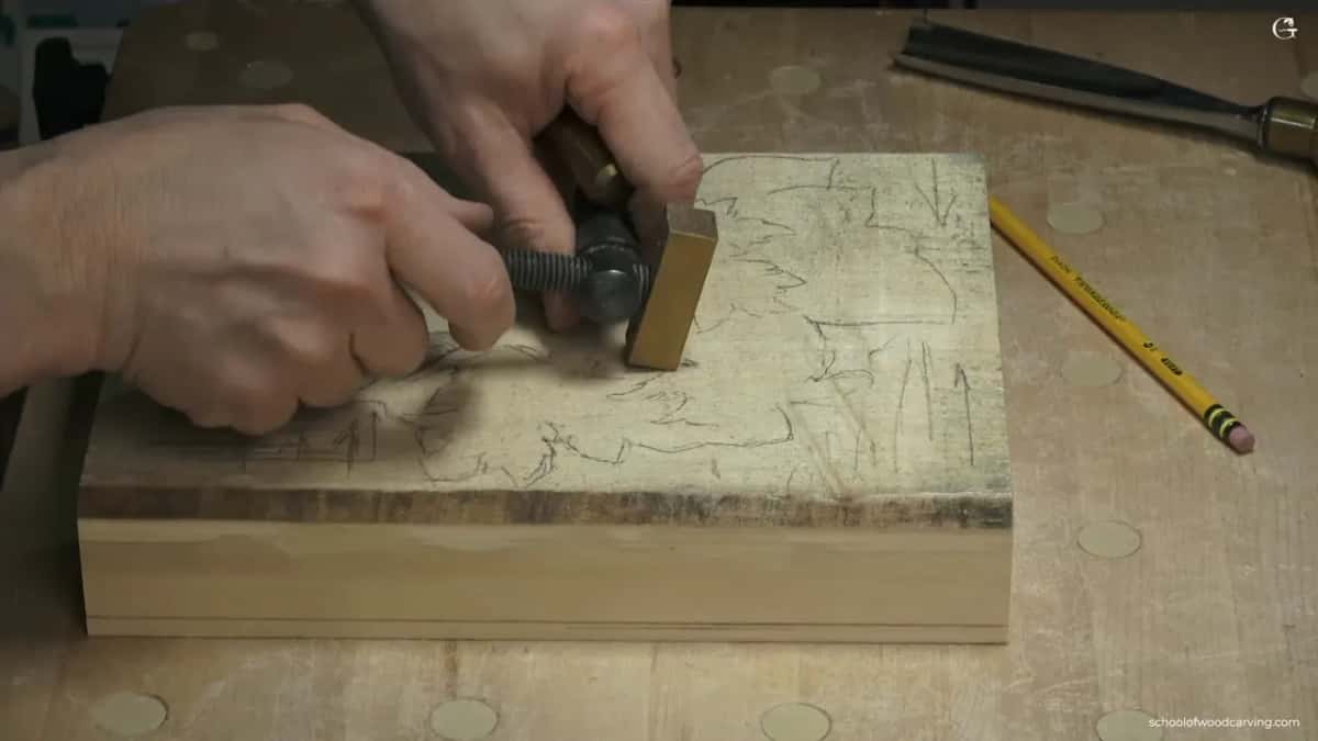 Panel held down with screw clamps and two bronze bench stops that drop into three quarter inch holes