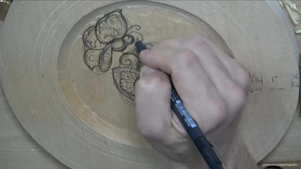 Drawing straight onto the wood Both butterflies drawn straight onto the round board in marker, no paper pattern taped down anywhere