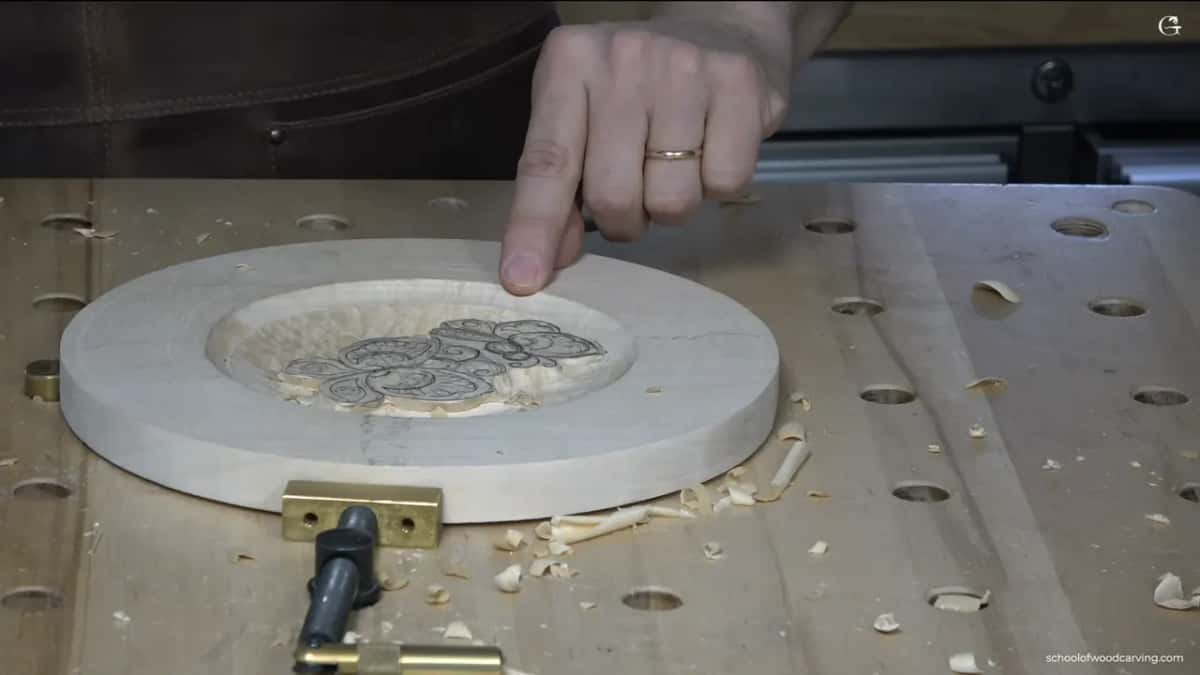 Butterflies on their island Carved plate on a turntable, both butterflies standing clear on an island of wood