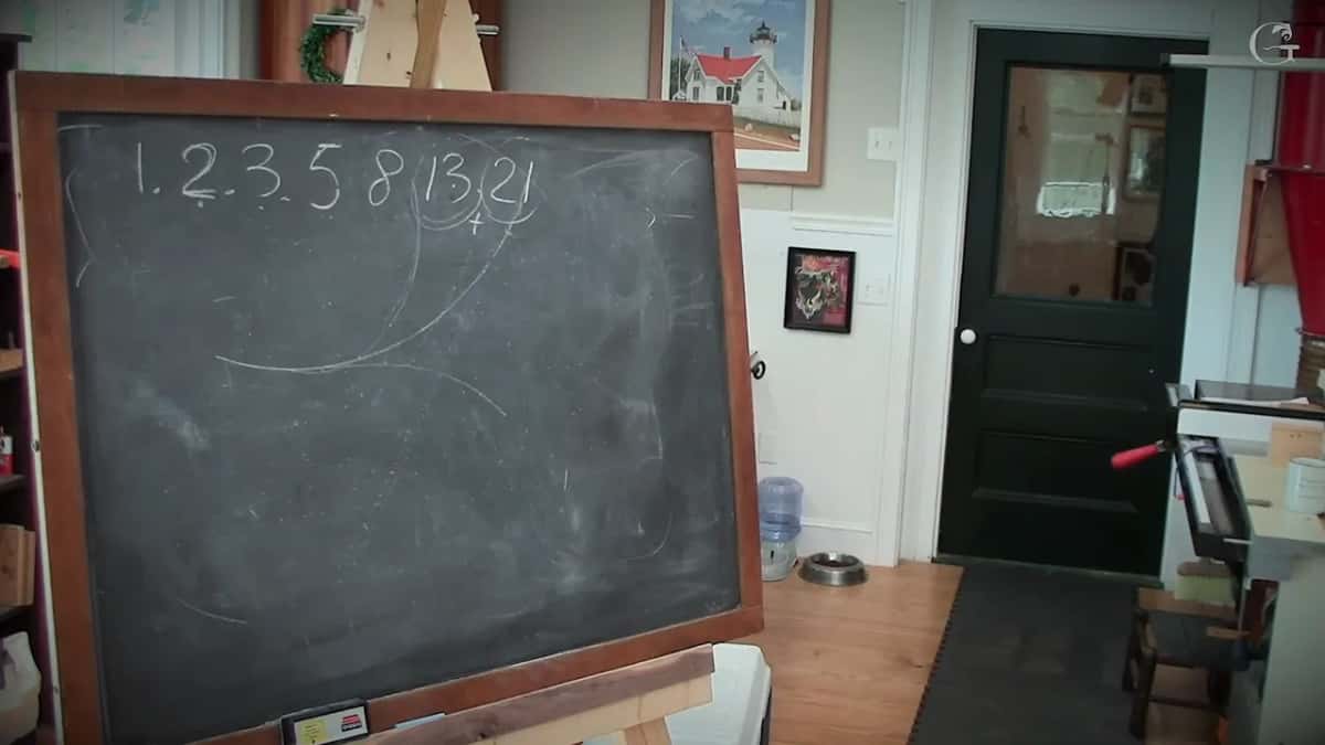 Fibonacci numbers chalked in the carving shop Chalkboard with 1, 2, 3, 5, 8, 13, 21