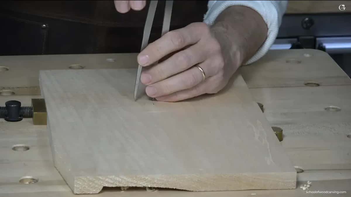 Steel dividers scribing a layout line