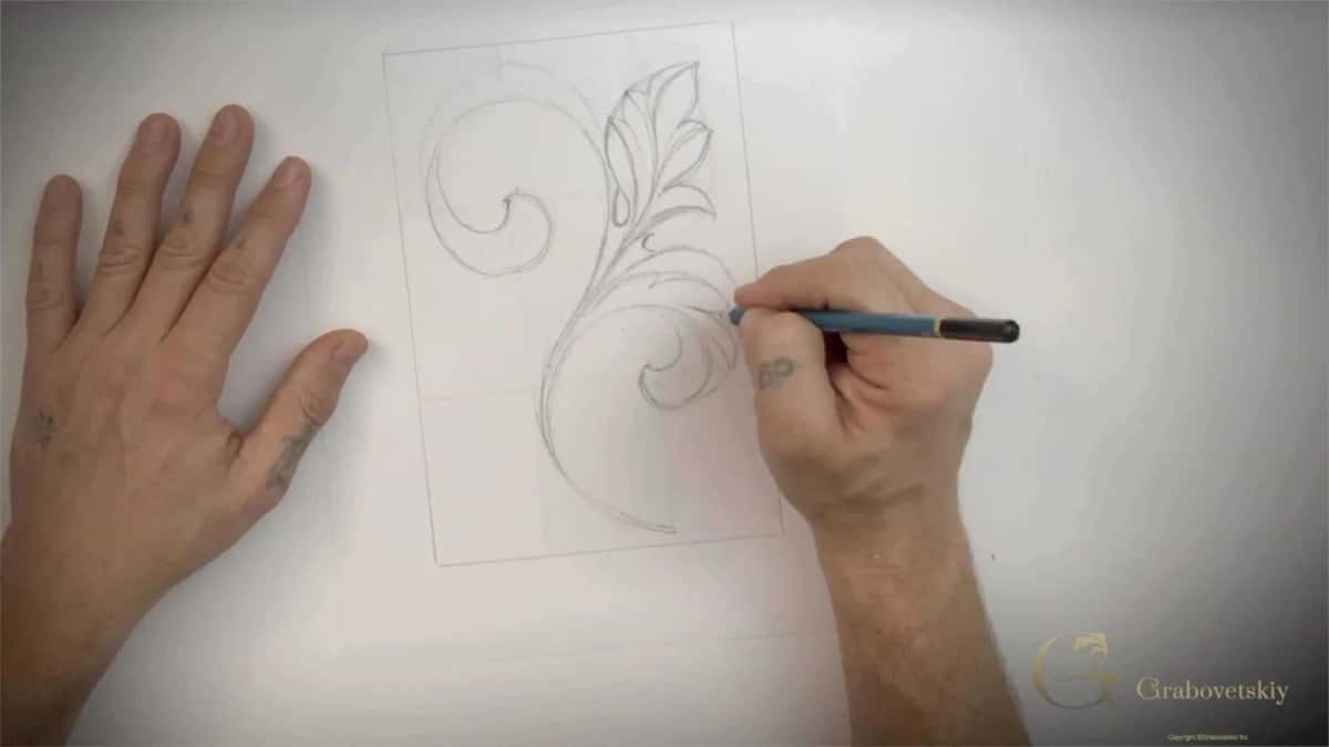 Volute on the left, and the first leaves drawn up along the flow line on the right