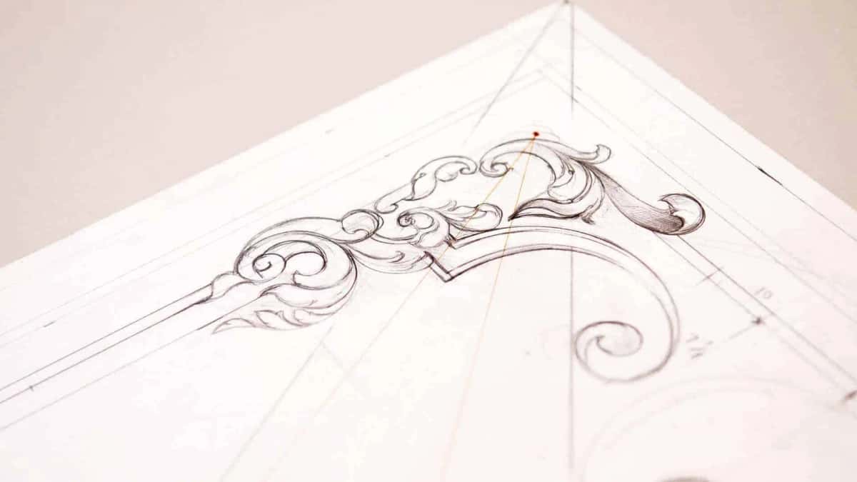 Pencil drawing of a corner scroll ornament with its construction lines still showing