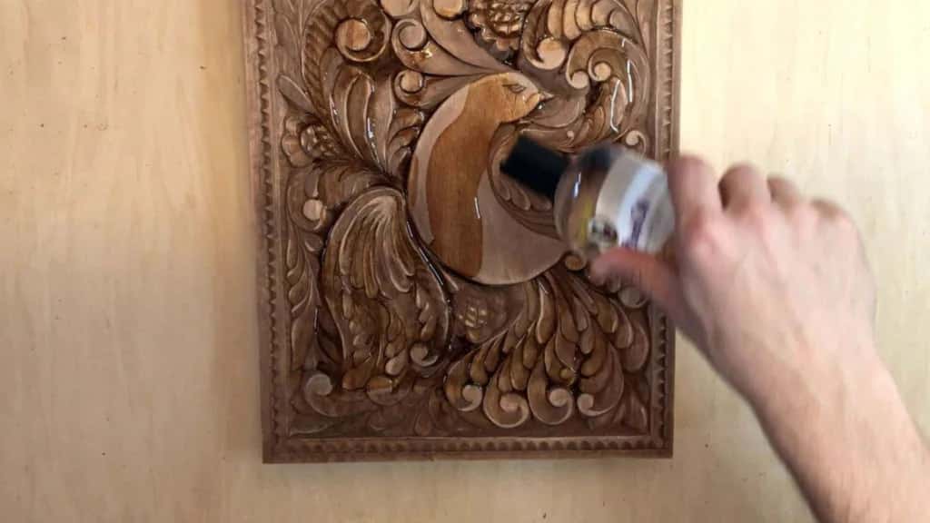 Rubbing the finish down into the cuts