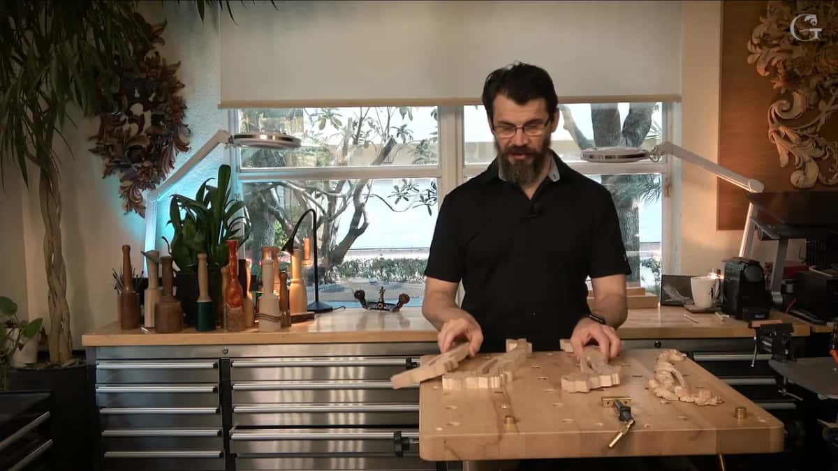 Sawn blanks set out on the bench, a row of turned mallets standing on the shelf behind