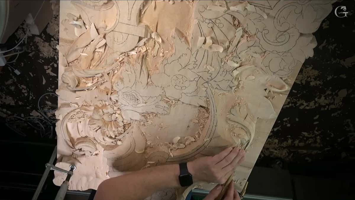 Panel turned around, hand working from the lower corner