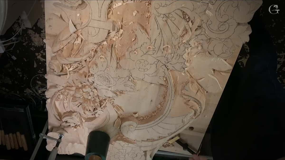 Whole panel from above, the green mallet at its lower edge and pencil drawing still covering most of the board