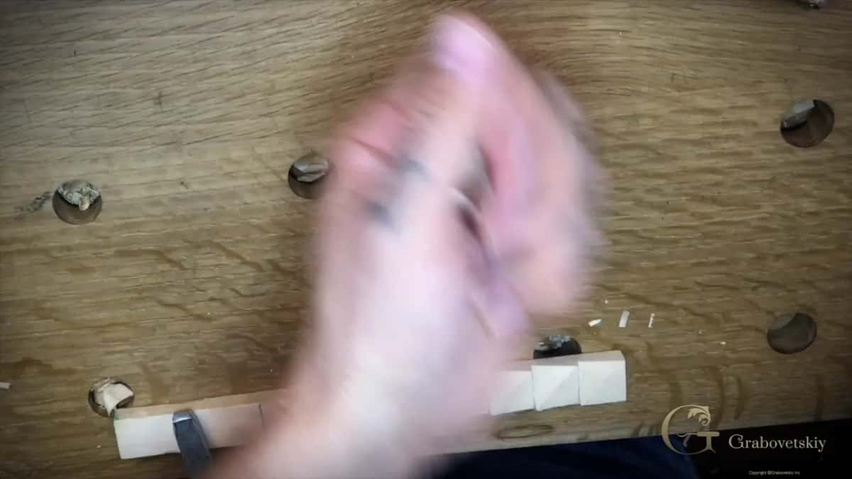 Hand moving over the strip, caught mid motion
