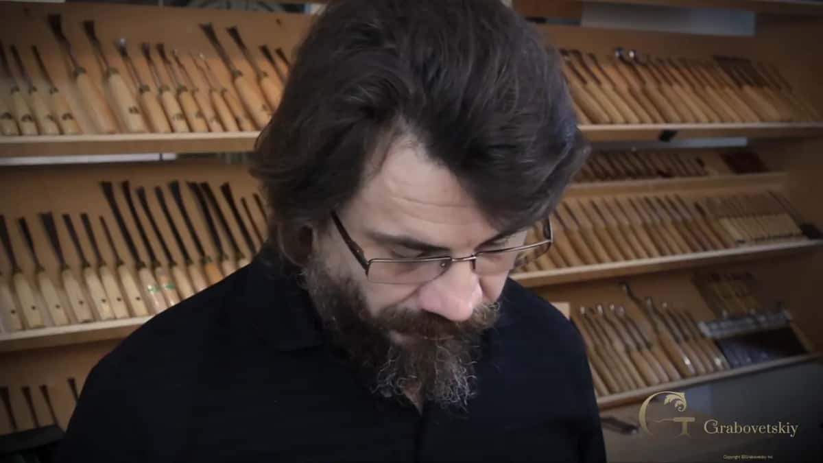 Head lowered as he explains