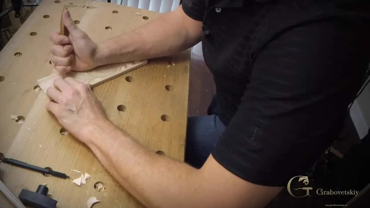 Waste coming out from between two parts of the design, chips gathering on the bench