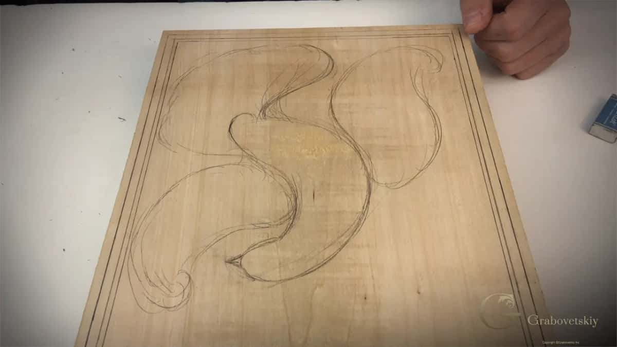Faint curves on the blank starting to read as a bird.