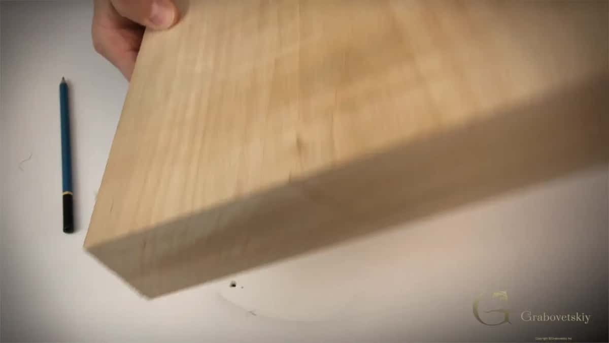 The blank, two inches thick, before a single pencil line.