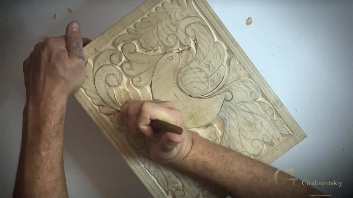 A bevel turning into an upright wall over the length of one single knife travel here.