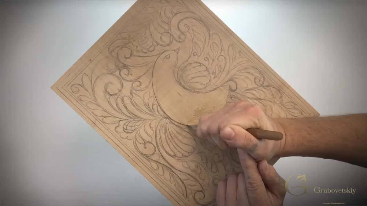 First pass around the outline, held upright so the wall drops straight.