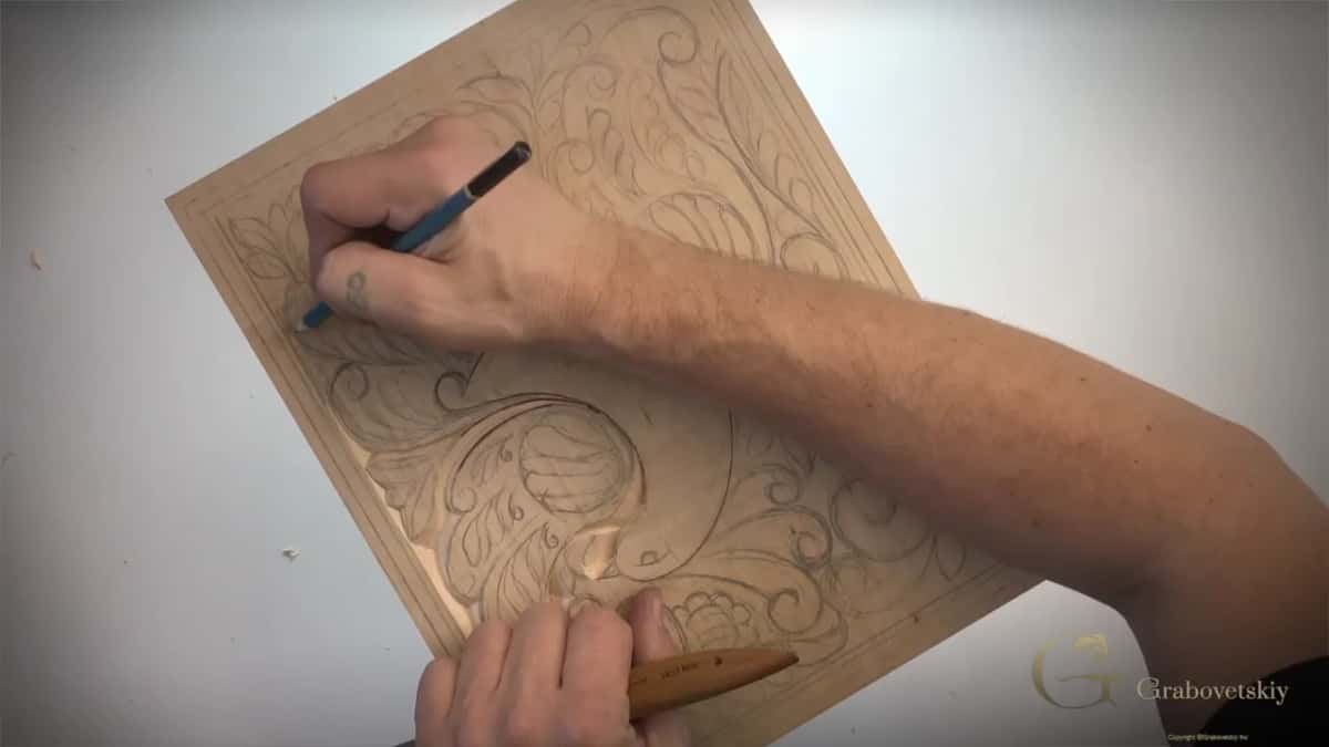 Working downhill with the grain, which is what stops the surface tearing.