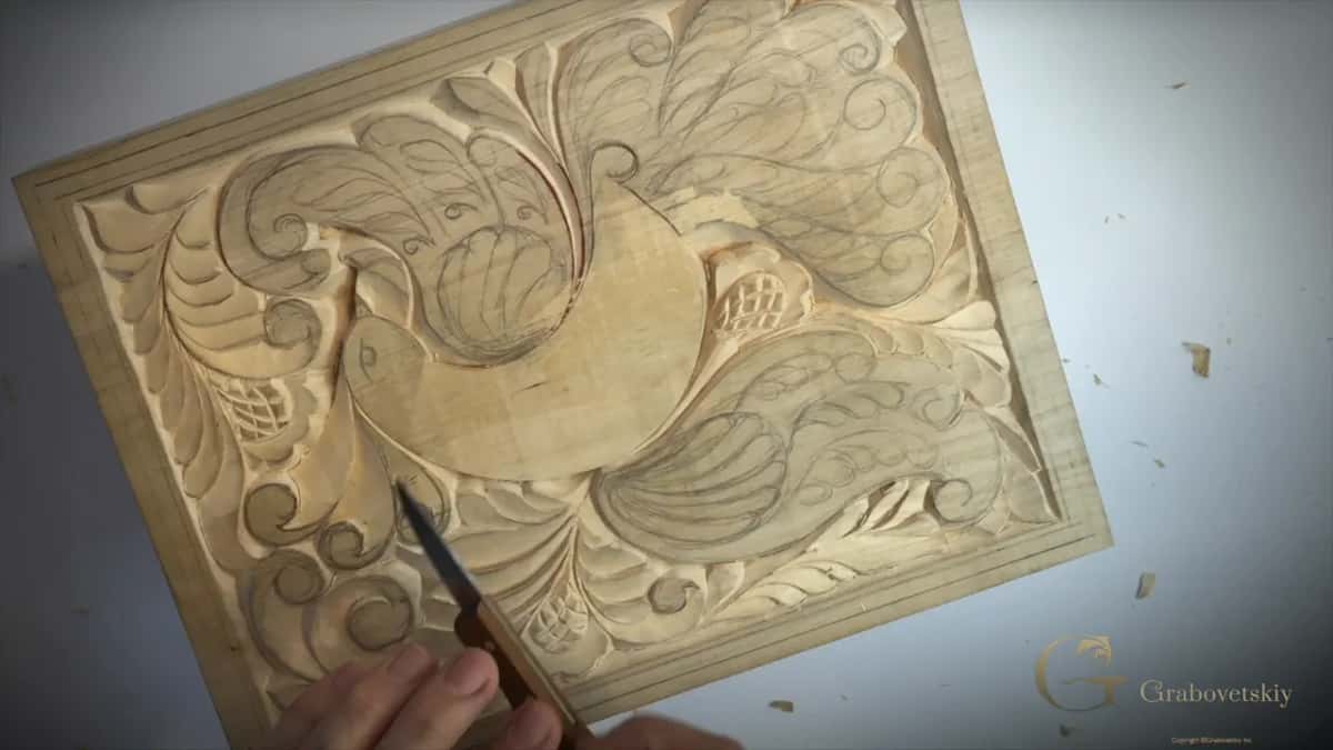 Held so the light comes from another direction, which is how hidden ridges appear.
