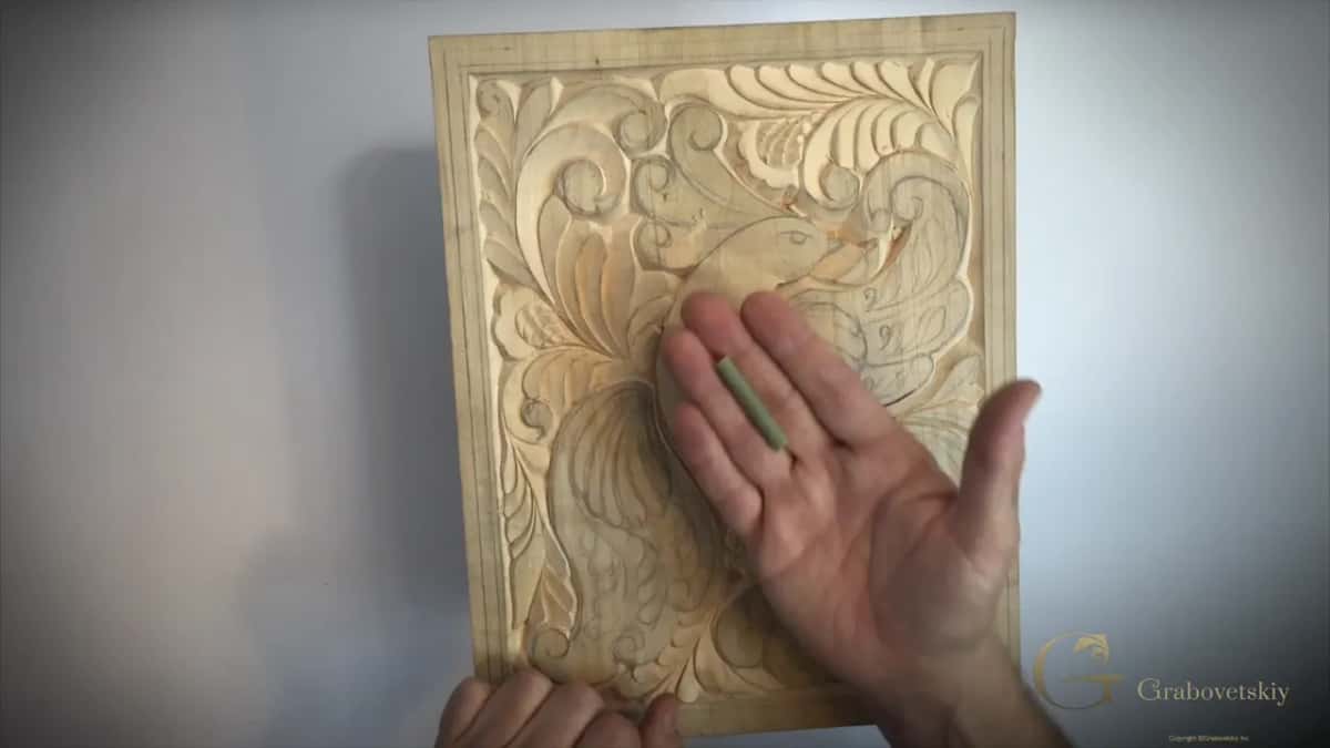 A cut length lying in an open palm.