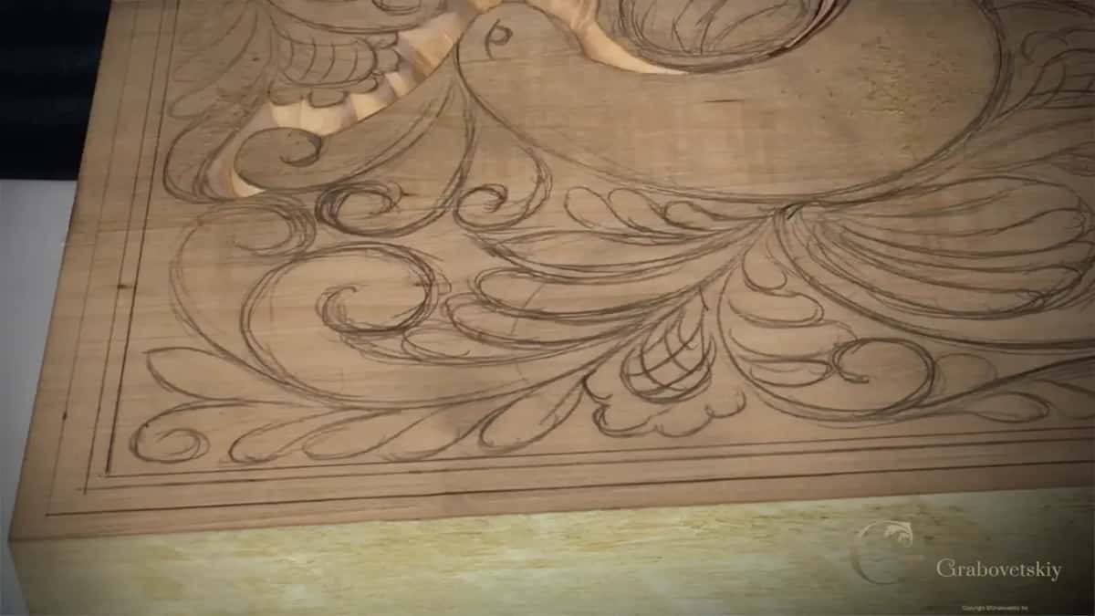 Half the board carved, half still in pencil.