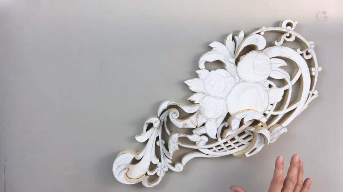 Panel flat on the bench, hands at its lower edge