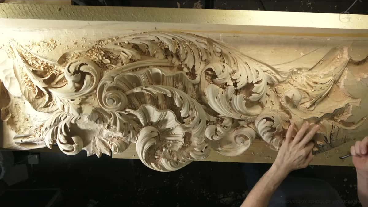 Overhead view of the whole panel, one hand resting near the right end