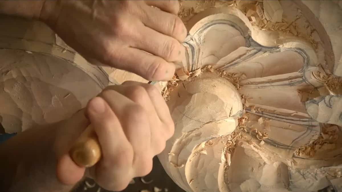 Two hands, one gouge