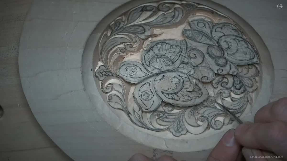 Carving below both butterflies