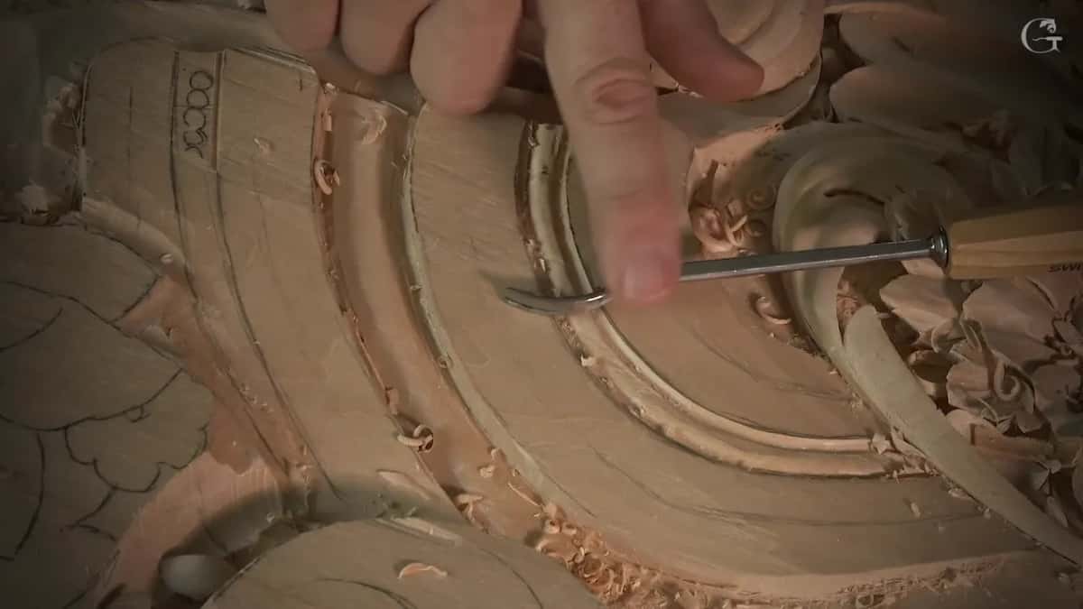 Thin bent tool laid across