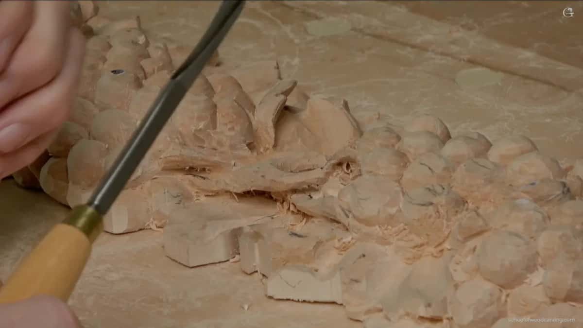 Gouge entering beside weak grain, corners held up out of the fibres