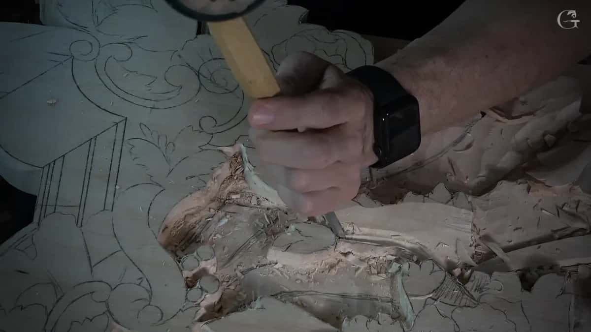 Knuckles wrapped round an upright handle