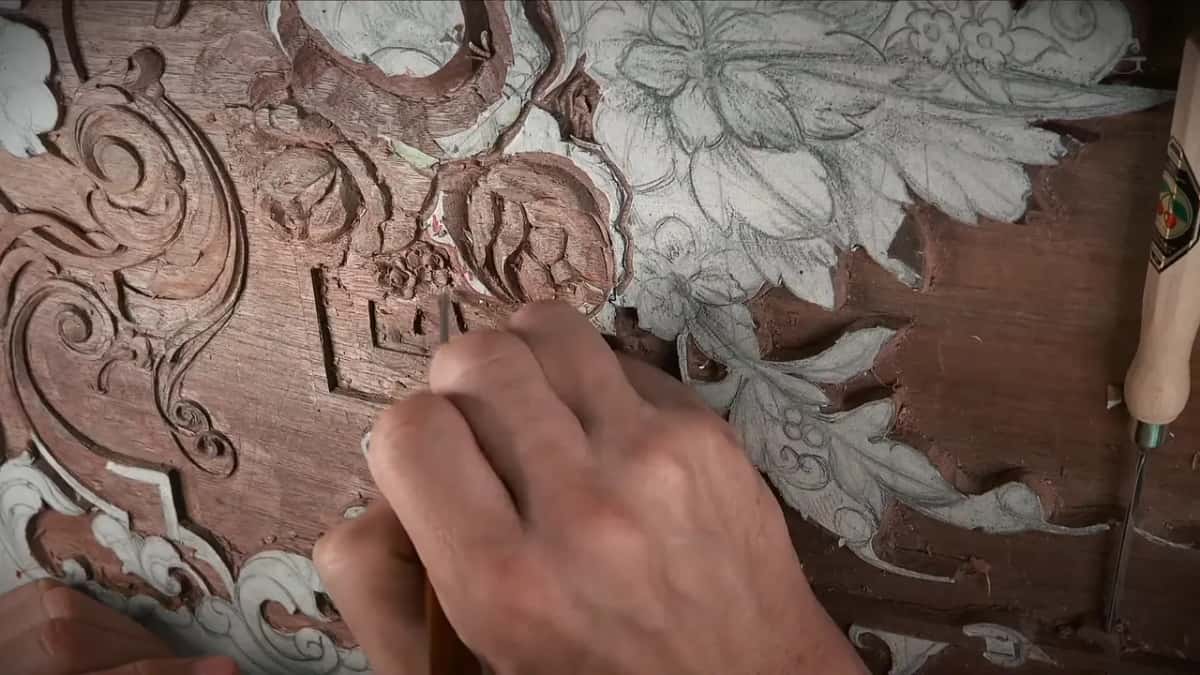 Fist closed around a handle on the board